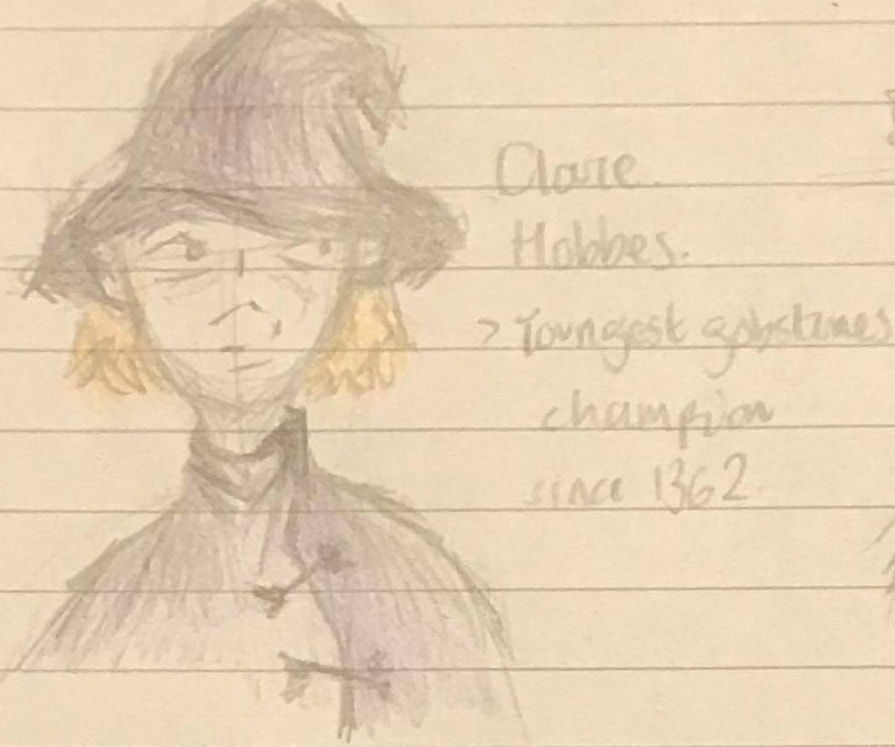 Drawing of Clare Hobbes, a witch with chin-length ginger hair wearing black robes and a witch's hat